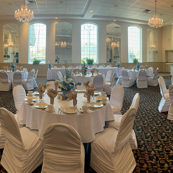 The King Room banquet hall features tall windows and large chandeliers