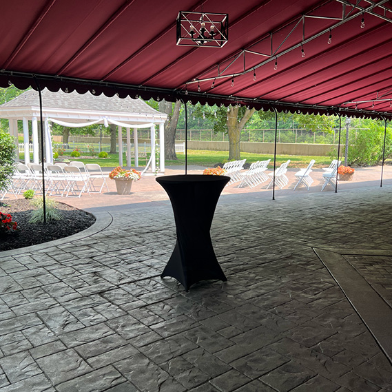 Red awning over a patio