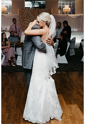 Couple's first dance in a ball room